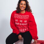 woman in red sweatshirt and black pants